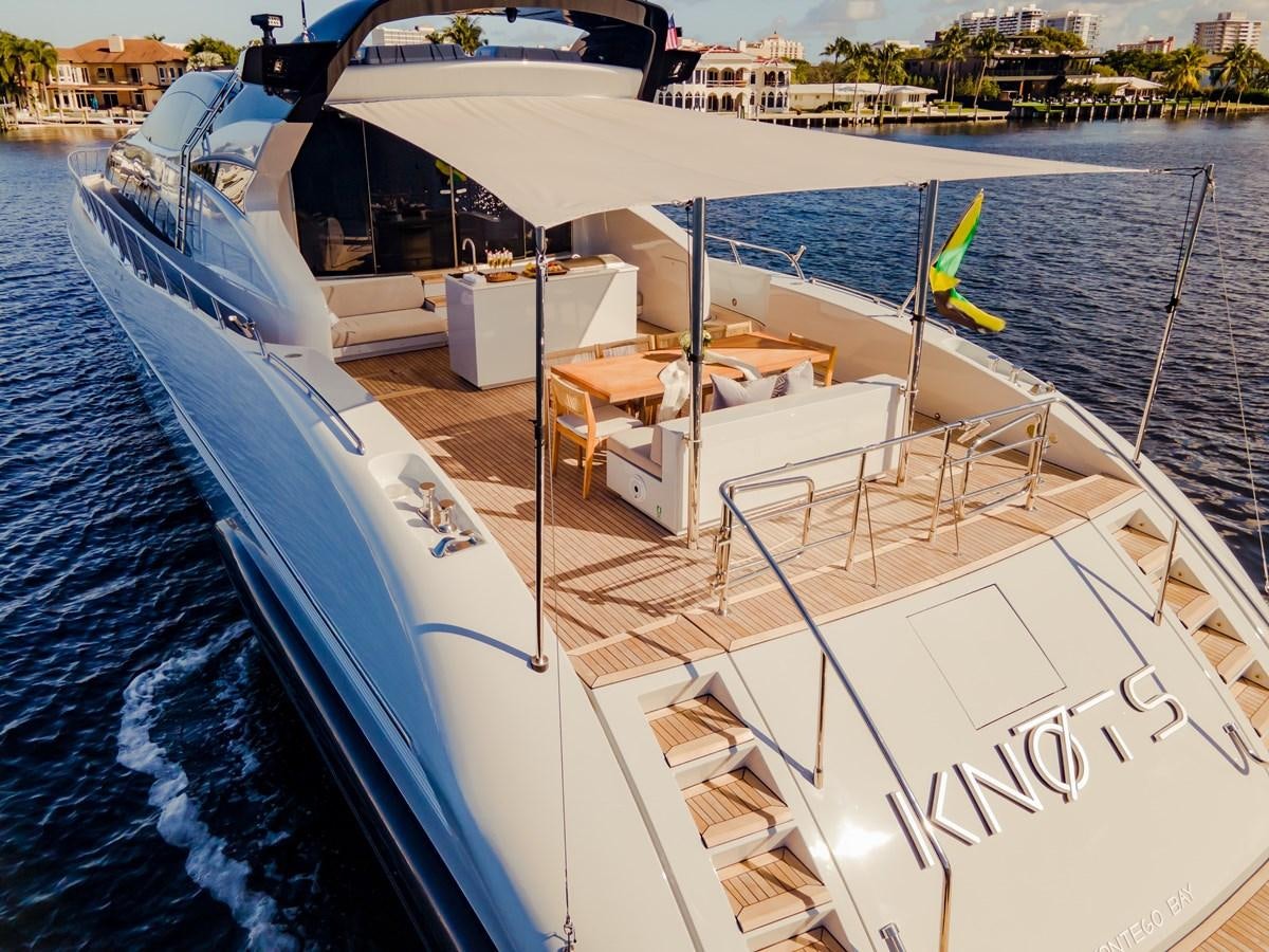 a boat with a canopy aboard 7 KNOTS Yacht for Sale