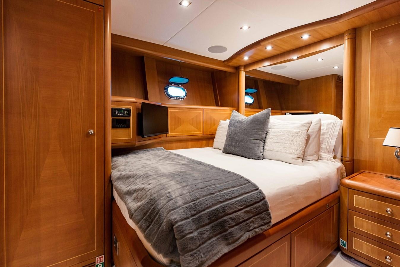 a bed in a room aboard 7 KNOTS Yacht for Sale