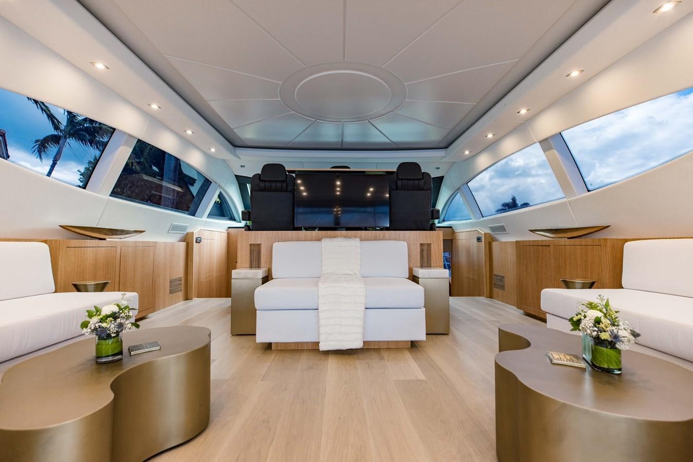 a room with a couch and a table aboard 7 KNOTS Yacht for Sale