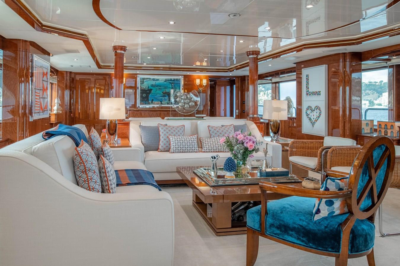 a living room with a couch and a table aboard CHECKMATE Yacht for Sale