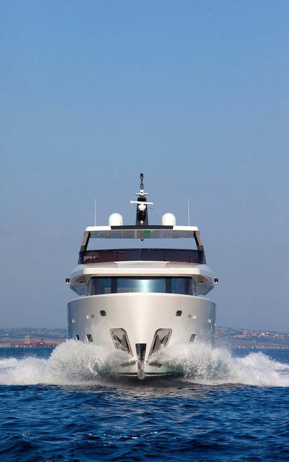 a large white boat in the water aboard YES Yacht for Sale
