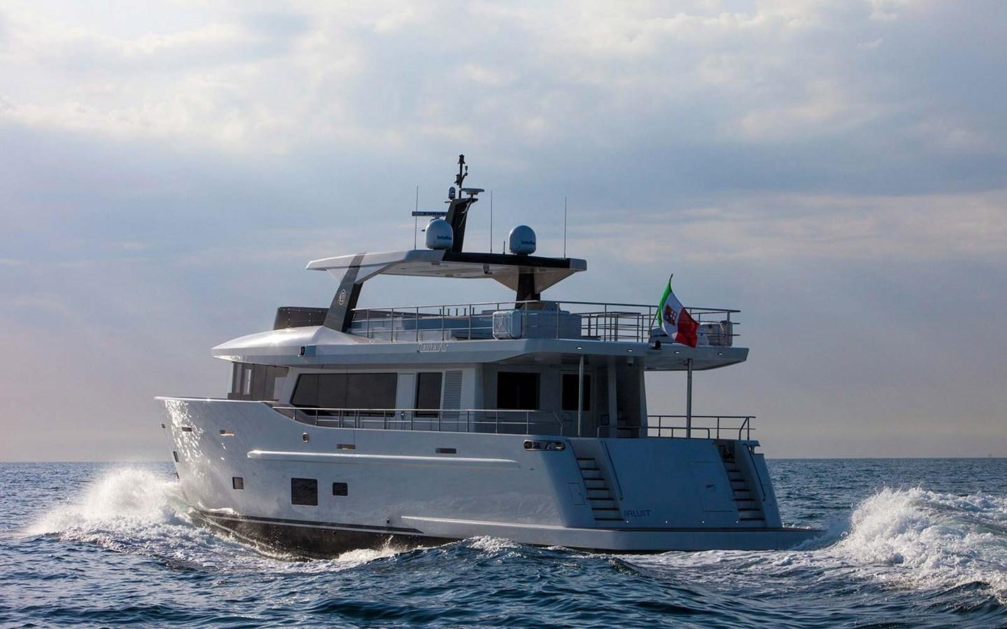 a large boat in the water aboard YES Yacht for Sale