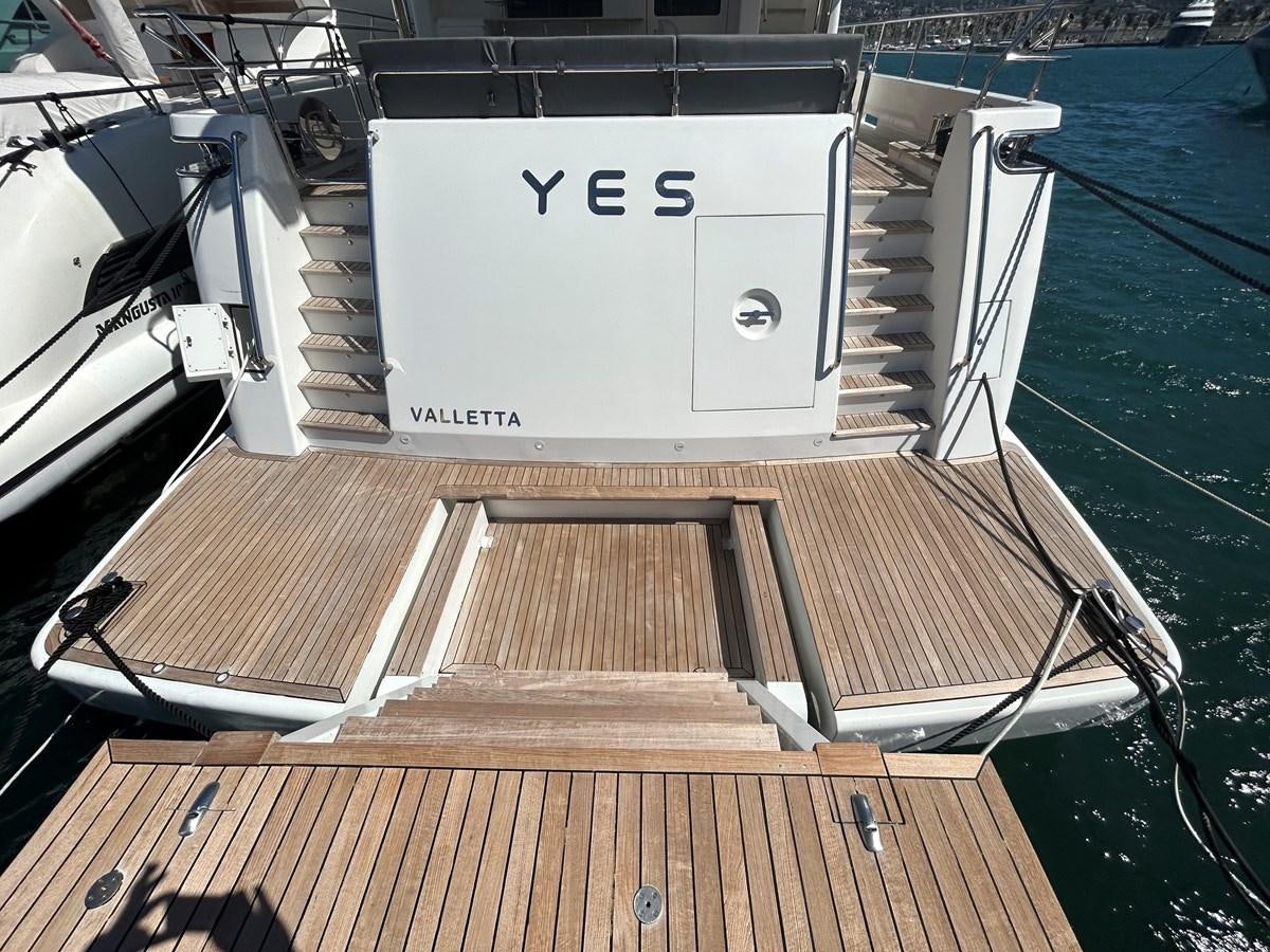 a boat on a deck aboard YES Yacht for Sale