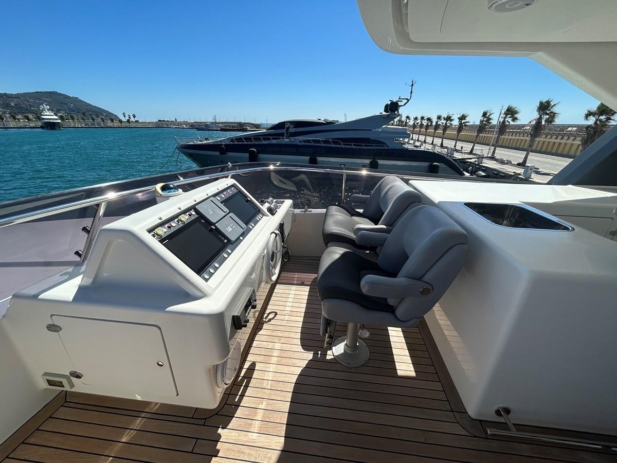 a boat on a deck aboard YES Yacht for Sale