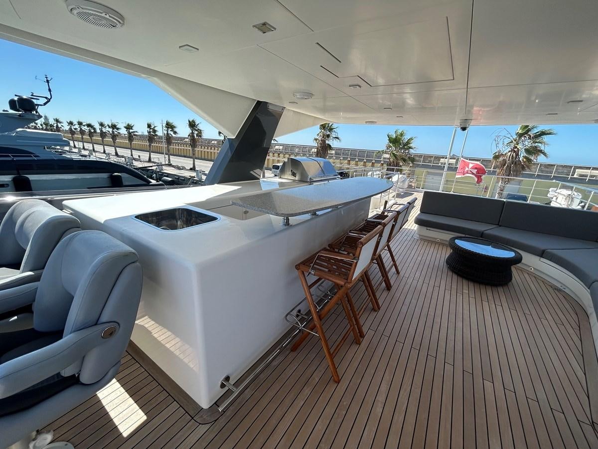 a boat on a deck aboard YES Yacht for Sale