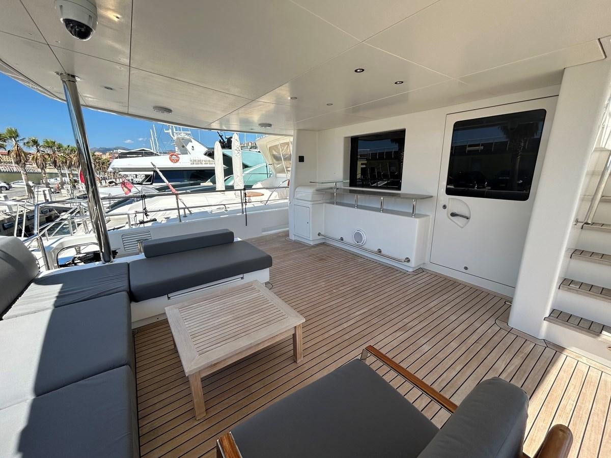 a room with a large window and a view of the water aboard YES Yacht for Sale