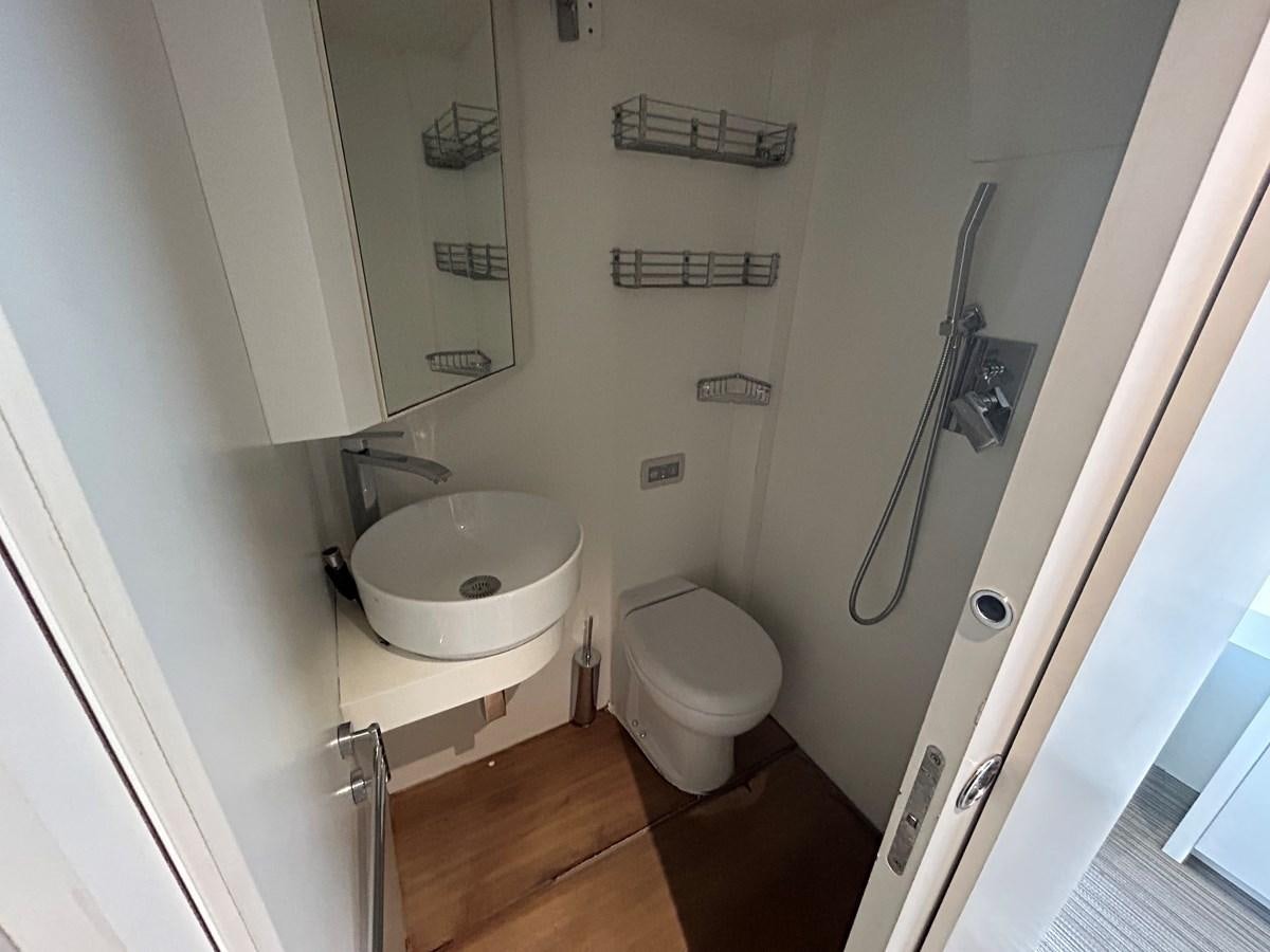 a bathroom with a sink and a toilet aboard YES Yacht for Sale
