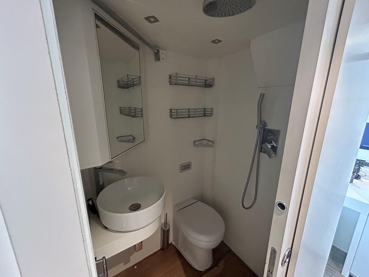 a bathroom with a sink and a toilet aboard YES Yacht for Sale