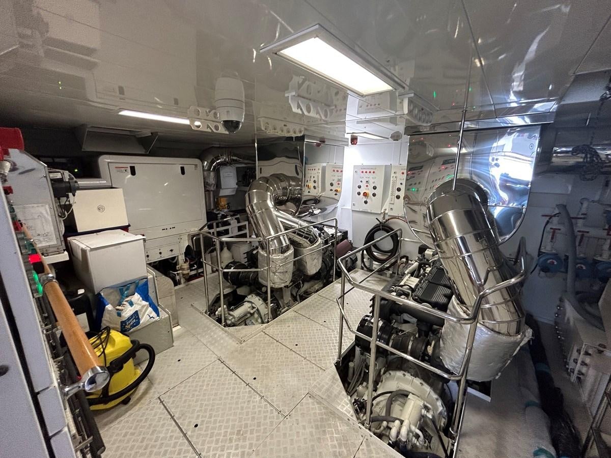 a room with machines and equipment aboard YES Yacht for Sale