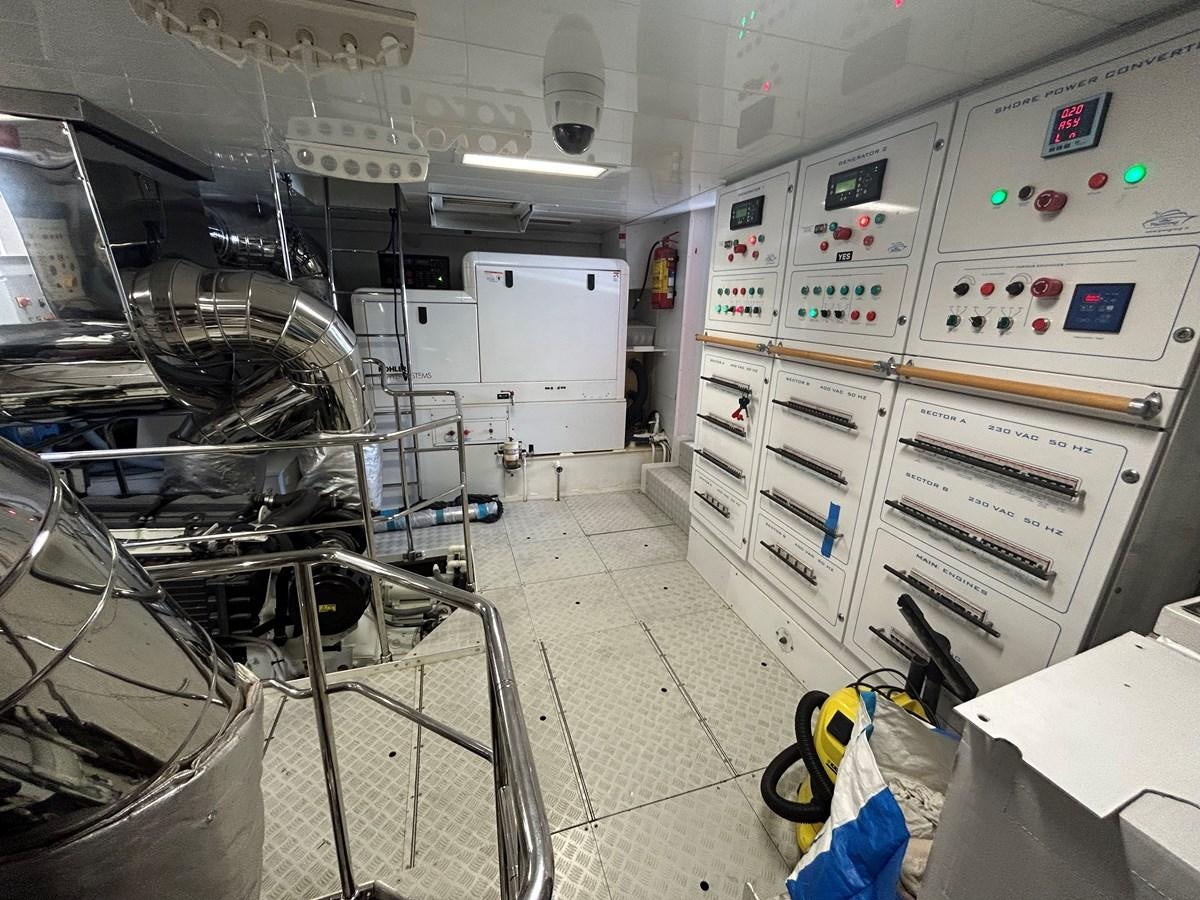 a room with white machines aboard YES Yacht for Sale