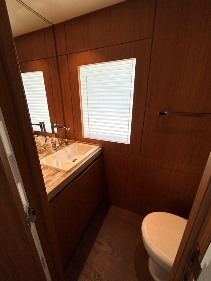 a bathroom with a sink and a toilet aboard YES Yacht for Sale