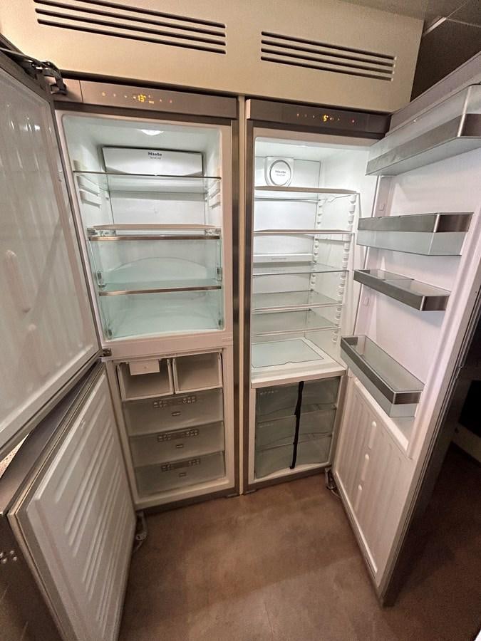 a room with shelves aboard YES Yacht for Sale