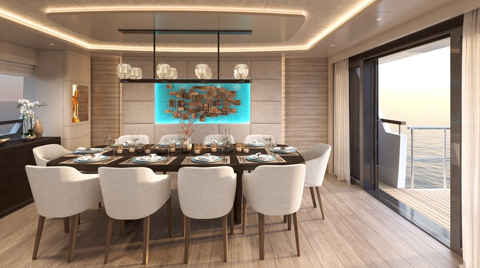 a large dining table with white chairs aboard THE VESSEL Yacht for Sale