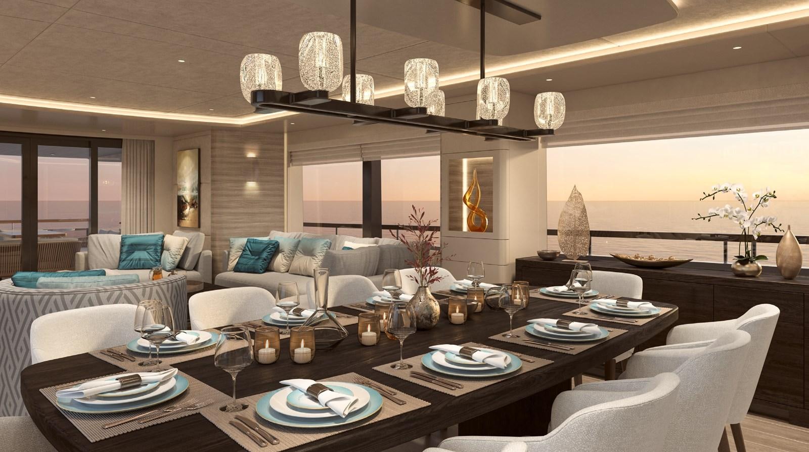 a large living room with a large table and chairs aboard THE VESSEL Yacht for Sale