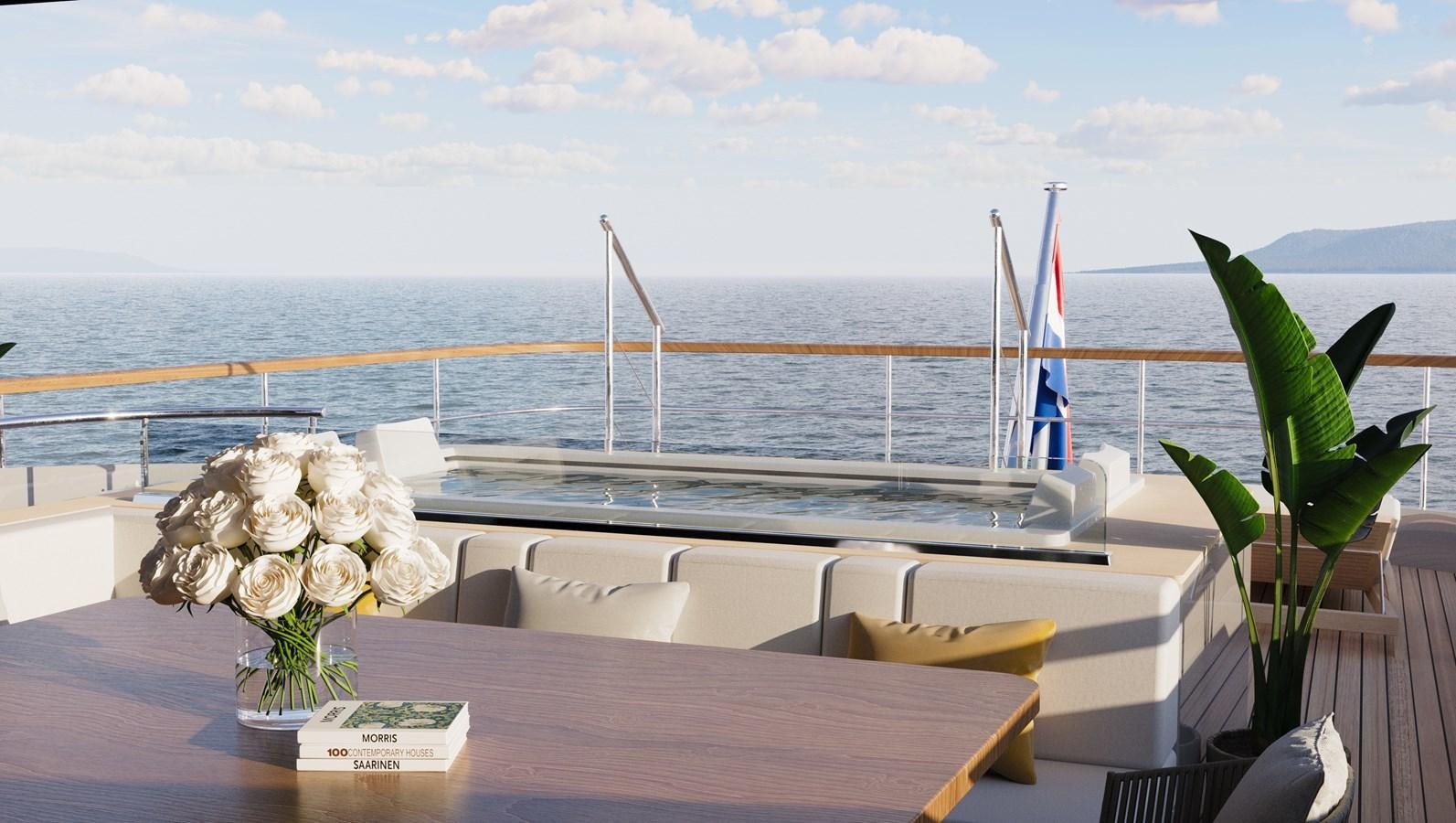 a table with white flowers on it aboard THE VESSEL Yacht for Sale