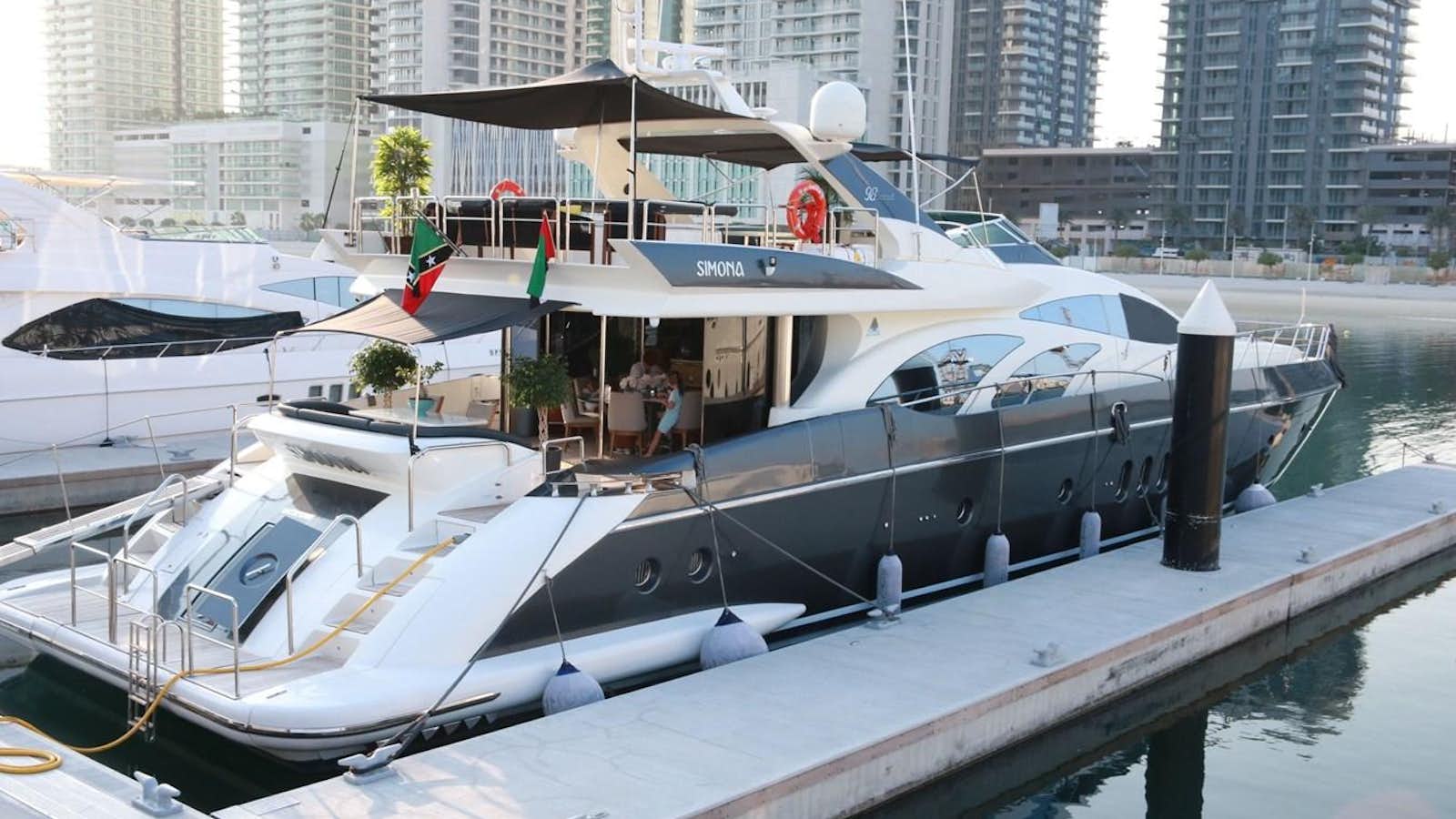 a boat docked at a pier aboard SIMONA Yacht for Sale