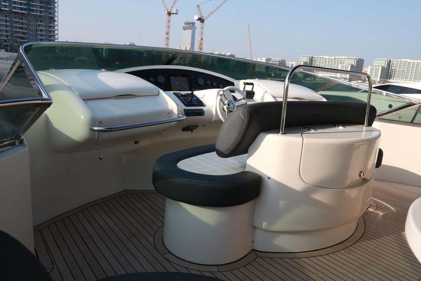 a white tub and a black seat on a car aboard SIMONA Yacht for Sale