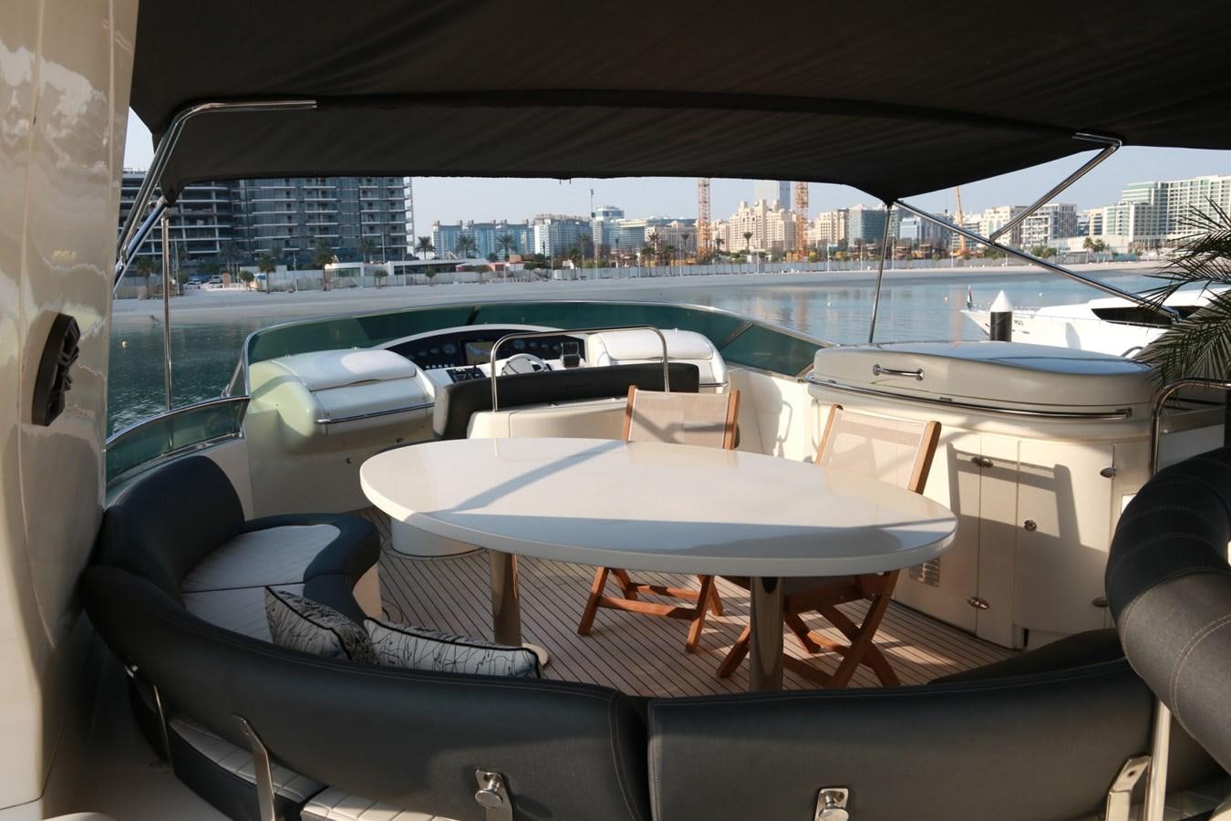 a table and chairs on a boat aboard SIMONA Yacht for Sale