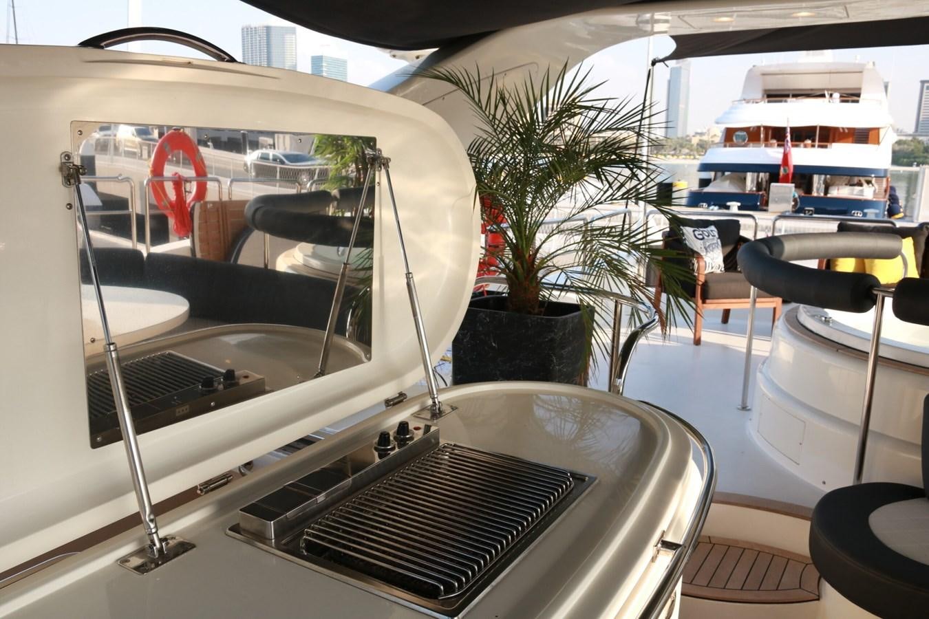 a white machine with a red logo aboard SIMONA Yacht for Sale