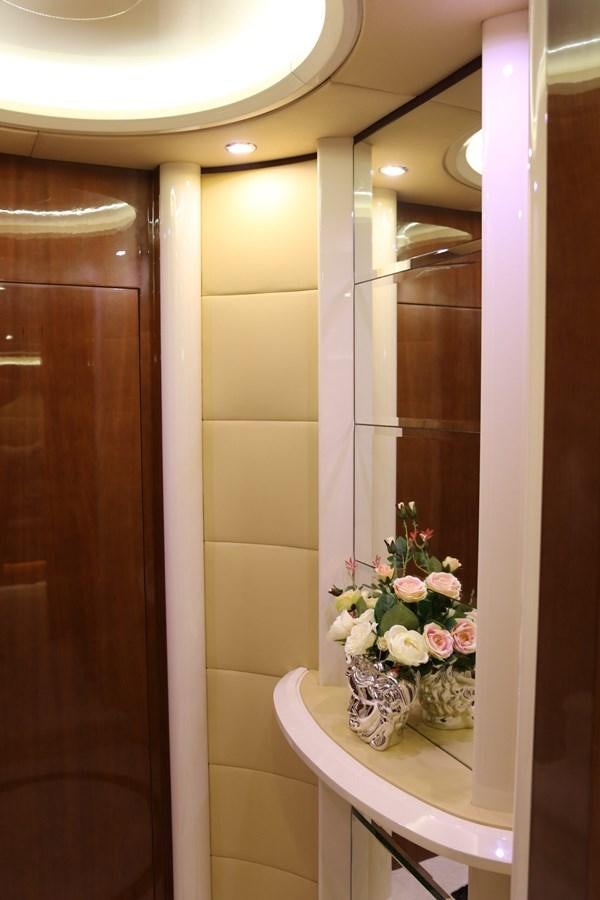 a vase of flowers on a shelf aboard SIMONA Yacht for Sale