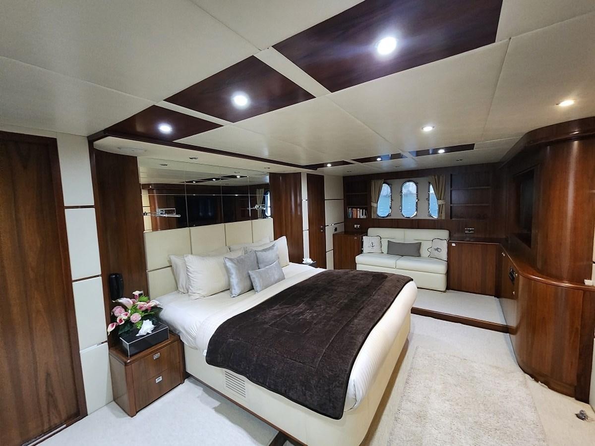 a large bedroom with a large bed aboard BLUE SAPPHIRE Yacht for Sale