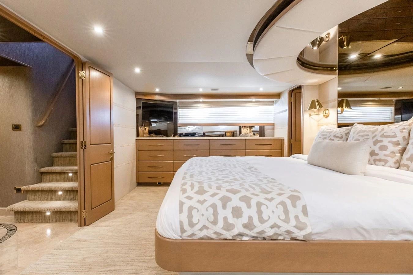 a large bedroom with a large bed aboard CHECKERED PAST Yacht for Sale