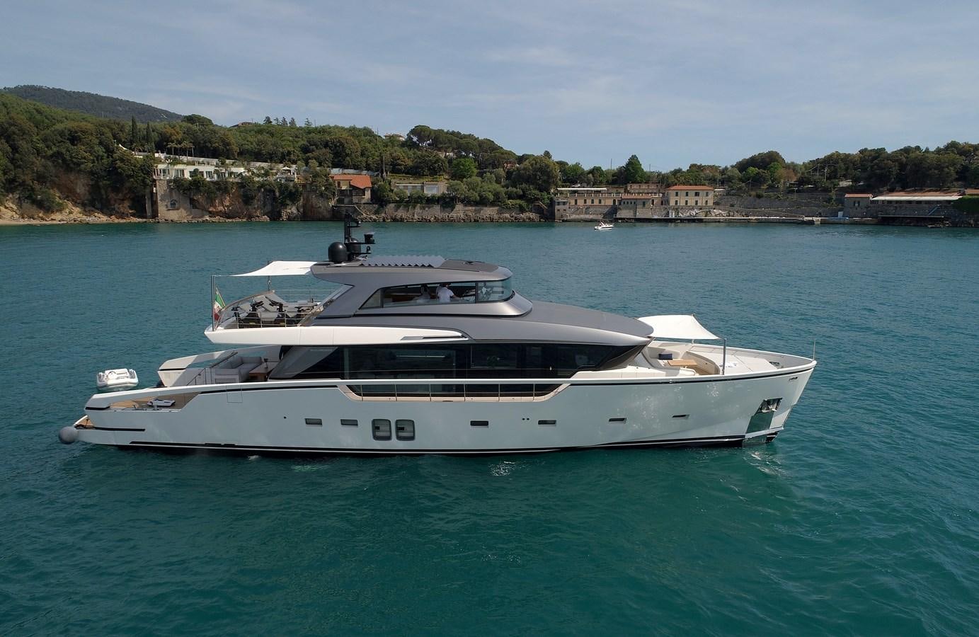 a white yacht in the water aboard ESTIA Yacht for Sale