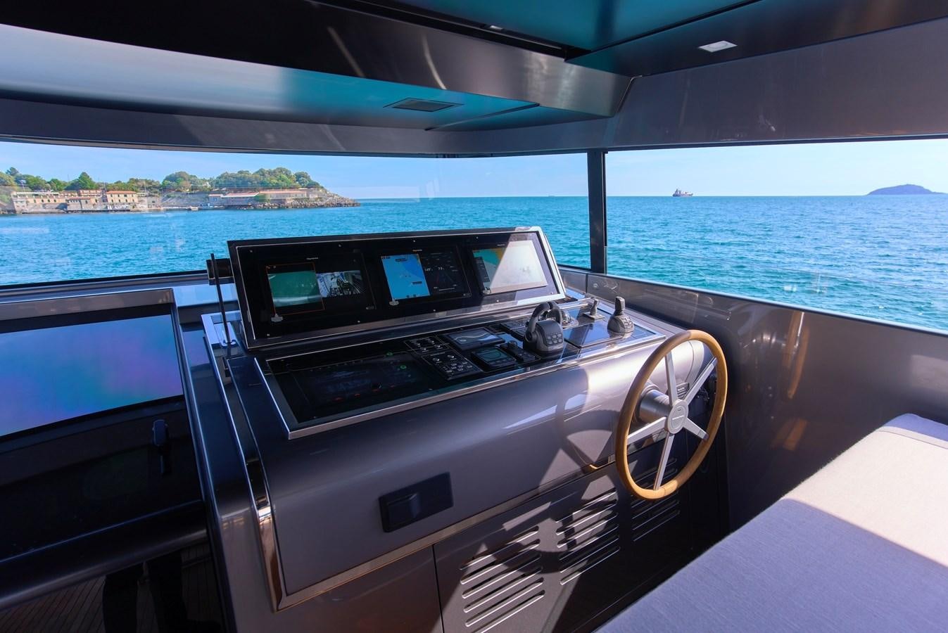 a boat with a laptop on it aboard ESTIA Yacht for Sale