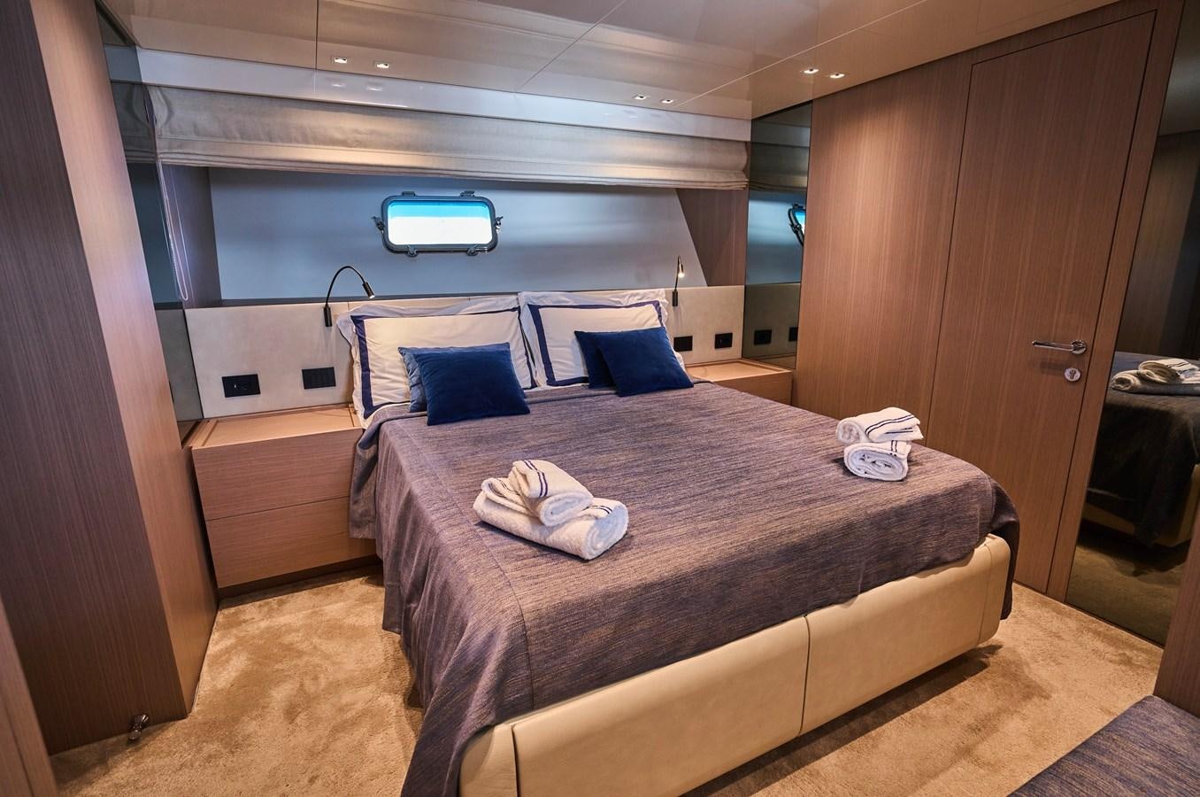 a bed in a room aboard ESTIA Yacht for Sale