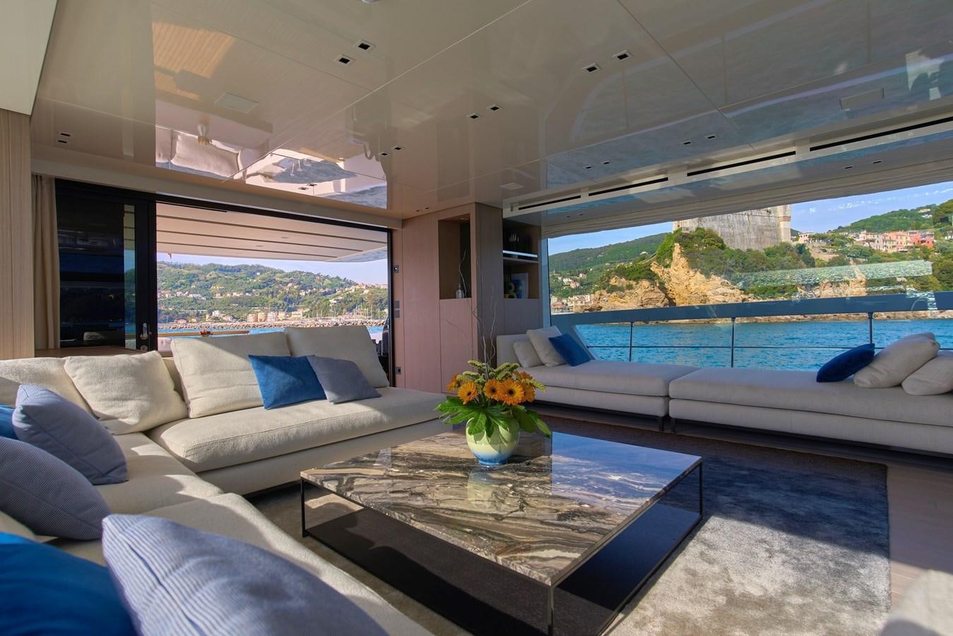 a living room with a large pool aboard ESTIA Yacht for Sale