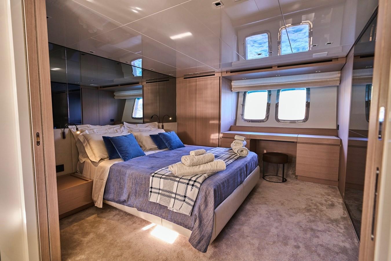 a bed in a room aboard ESTIA Yacht for Sale