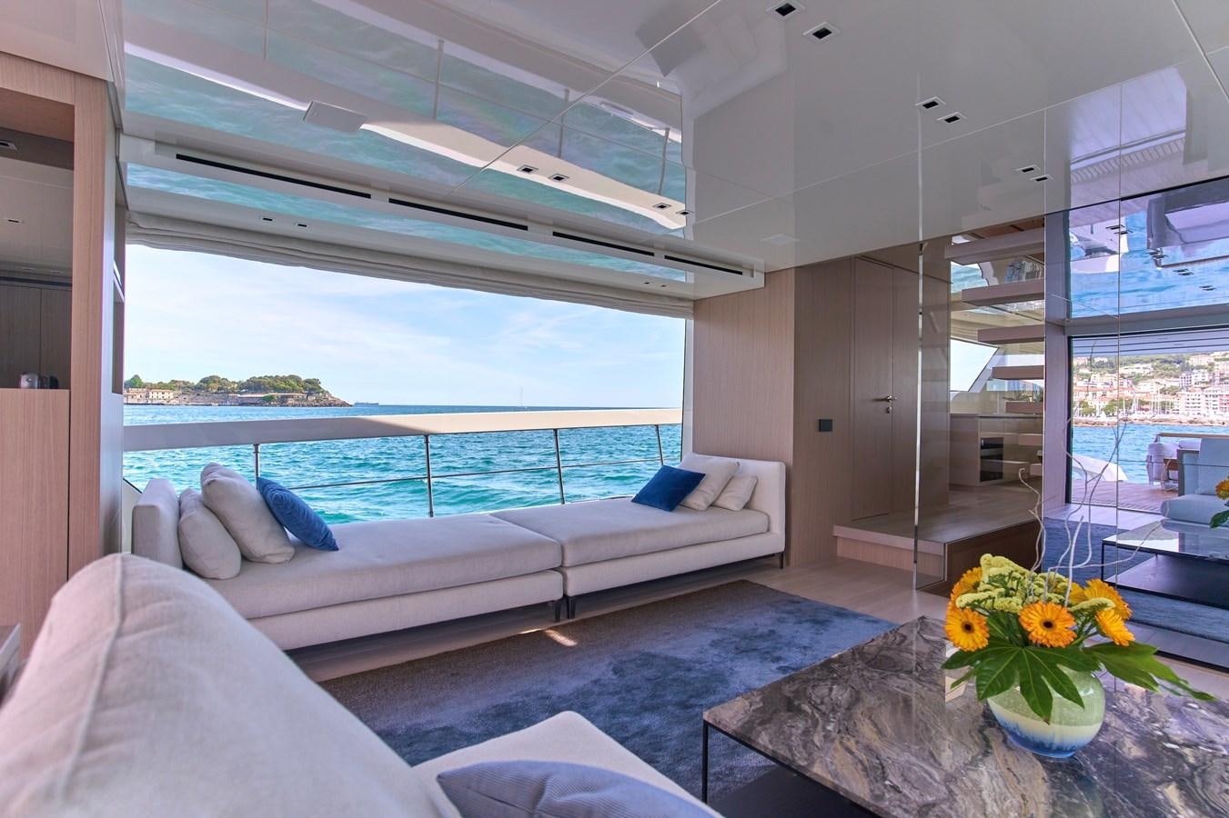 a room with a bed and a table aboard ESTIA Yacht for Sale