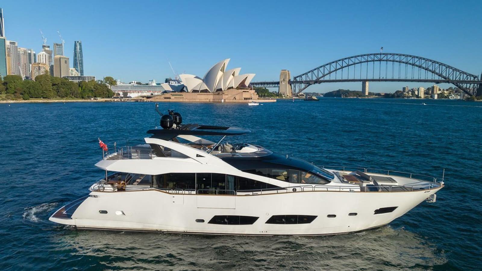 a white yacht in the water aboard ULTRAVIOLET Yacht for Sale