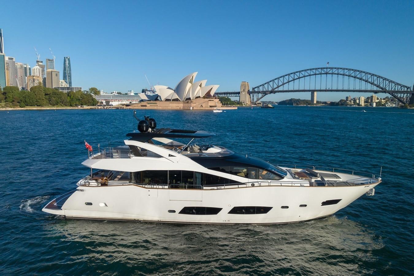 a white yacht in the water aboard ULTRAVIOLET Yacht for Sale