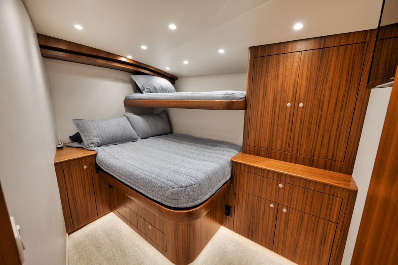 a bed in a room aboard FULL TIME Yacht for Sale