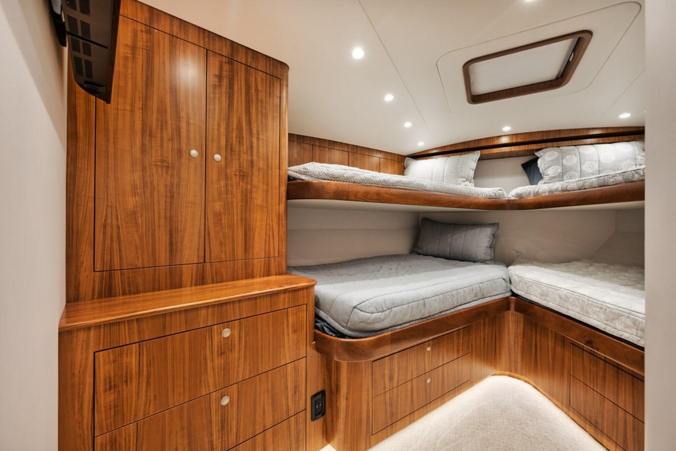 a bed in a room aboard FULL TIME Yacht for Sale