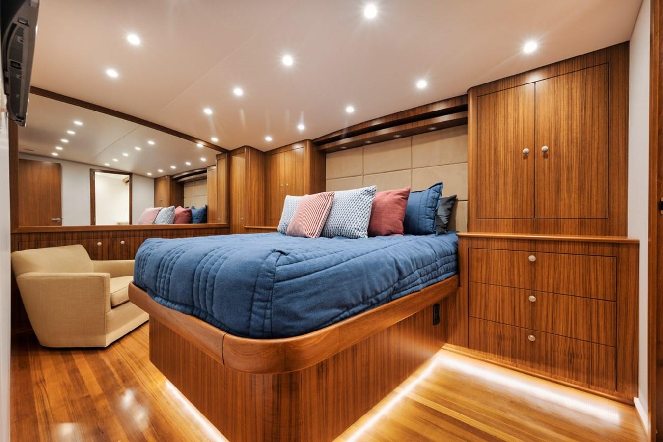 a bed in a room aboard FULL TIME Yacht for Sale