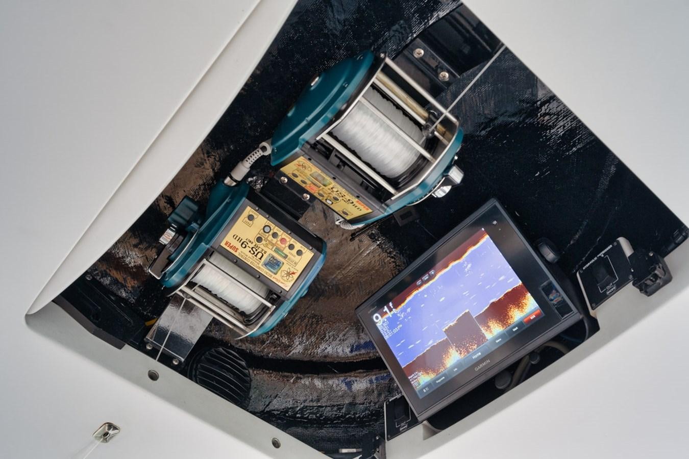 a computer screen on a white surface aboard FULL TIME Yacht for Sale