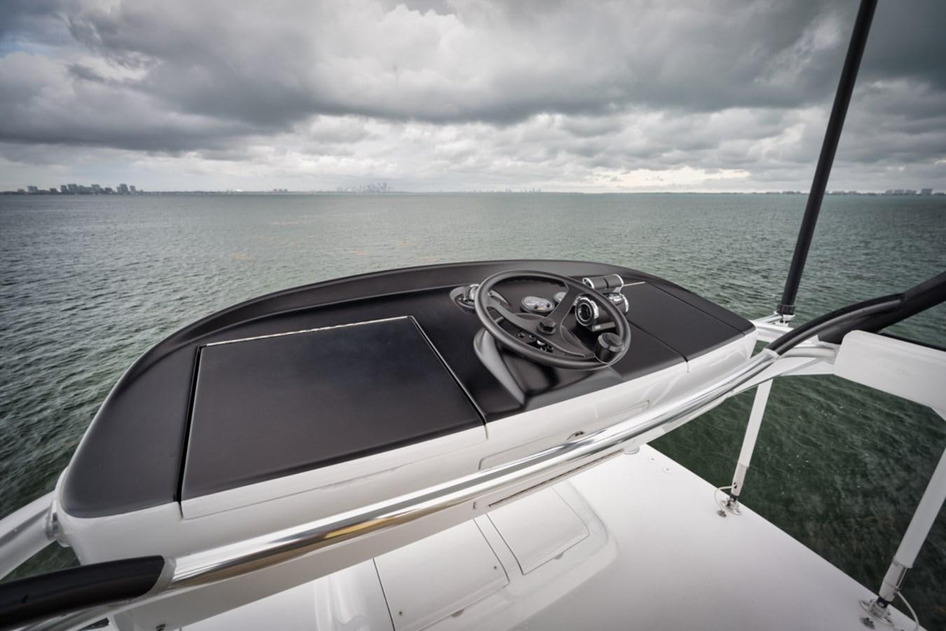 a steering wheel on a boat aboard FULL TIME Yacht for Sale