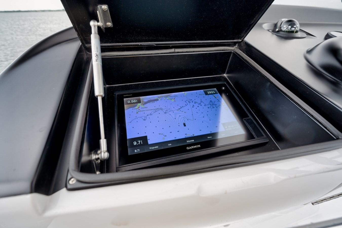 a close-up of a car stereo aboard FULL TIME Yacht for Sale