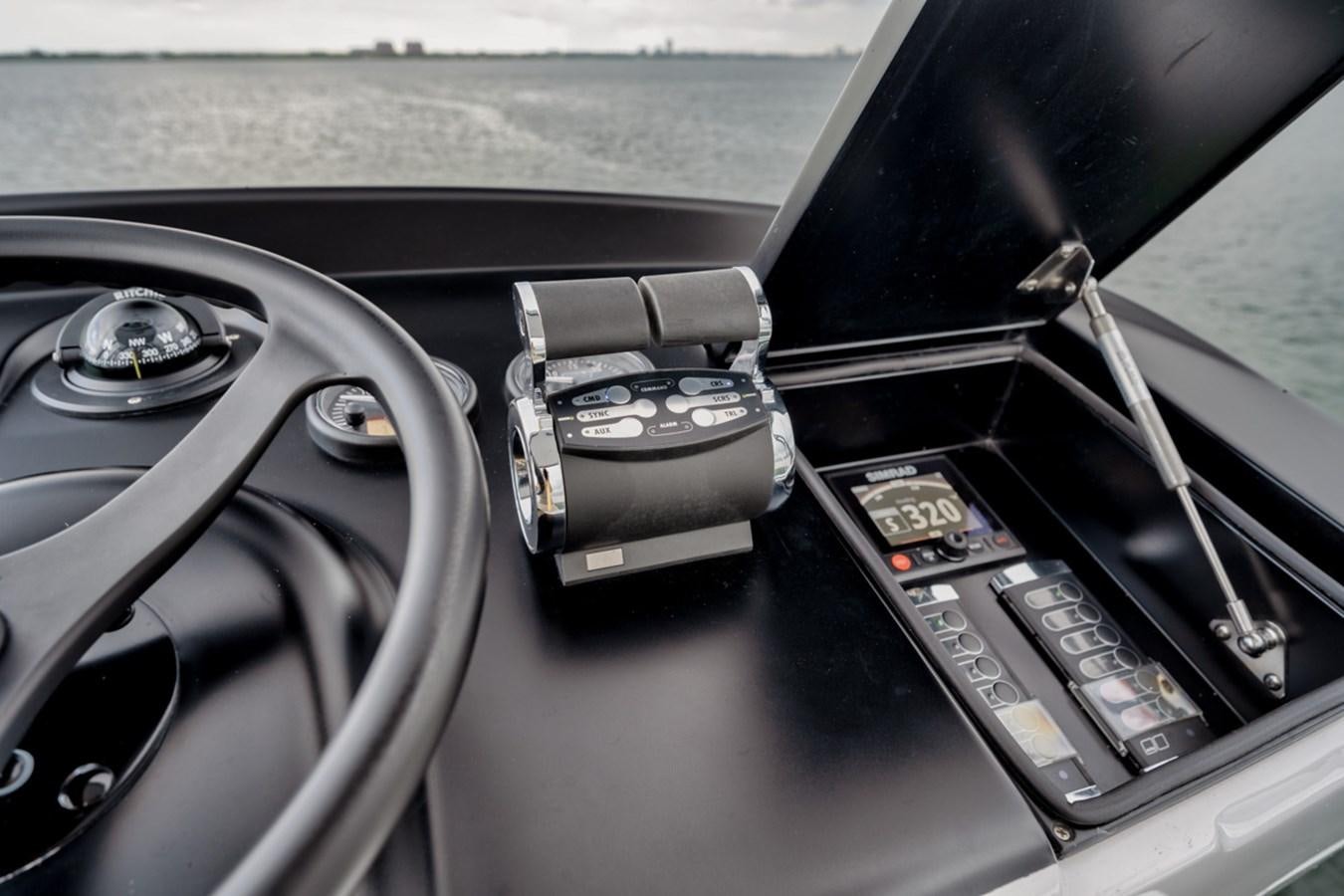 the inside of a car aboard FULL TIME Yacht for Sale