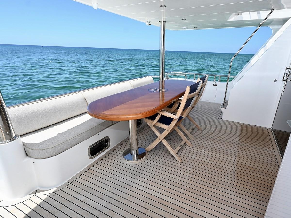 a boat on a deck aboard KNOT FLYING Yacht for Sale