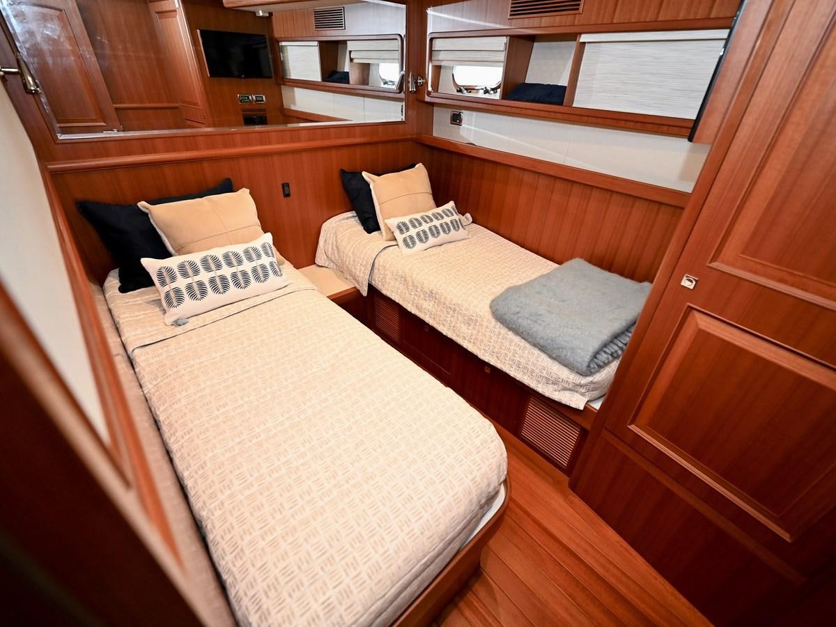 a bed in a room aboard KNOT FLYING Yacht for Sale