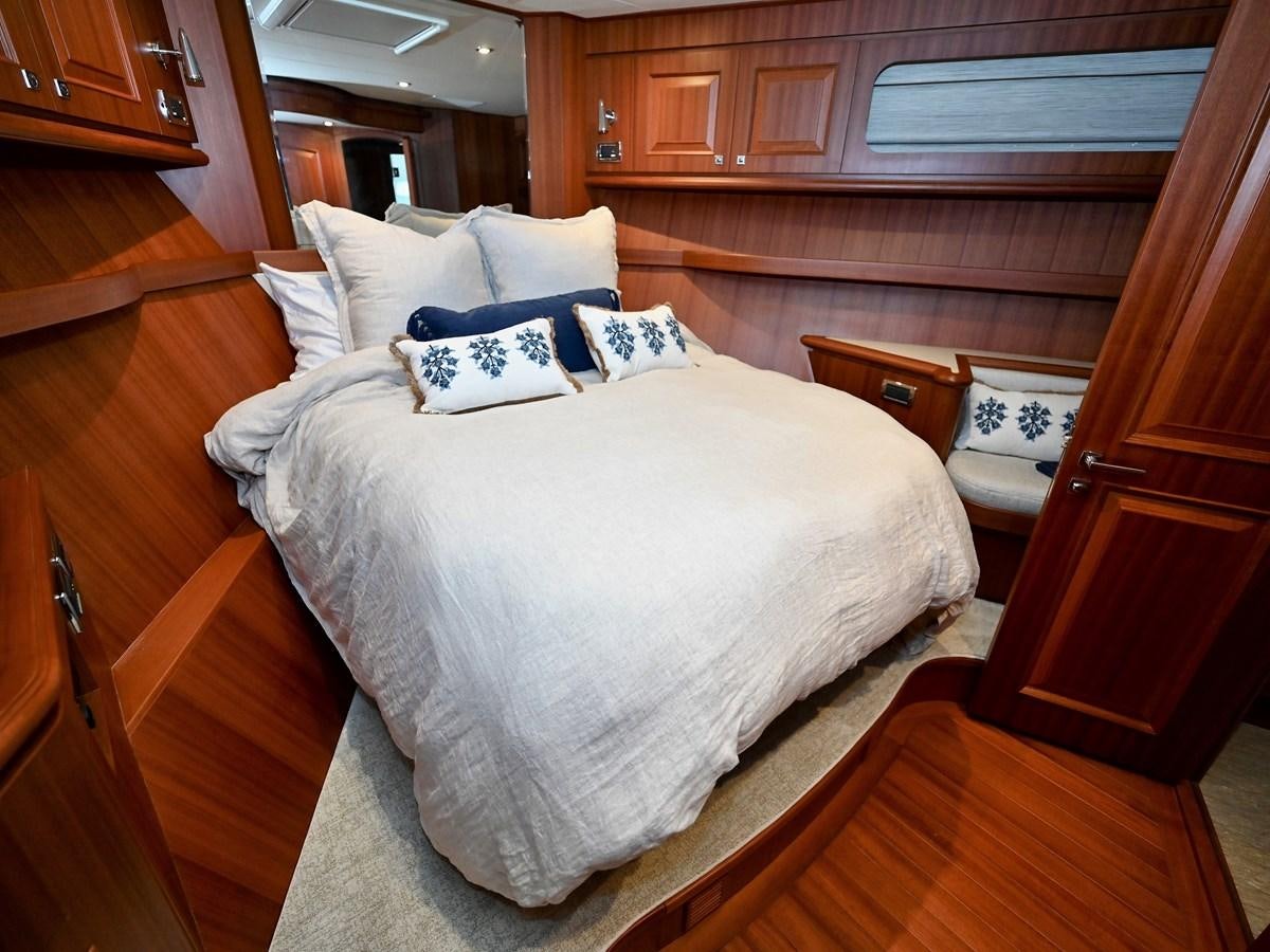 a bed in a room aboard KNOT FLYING Yacht for Sale