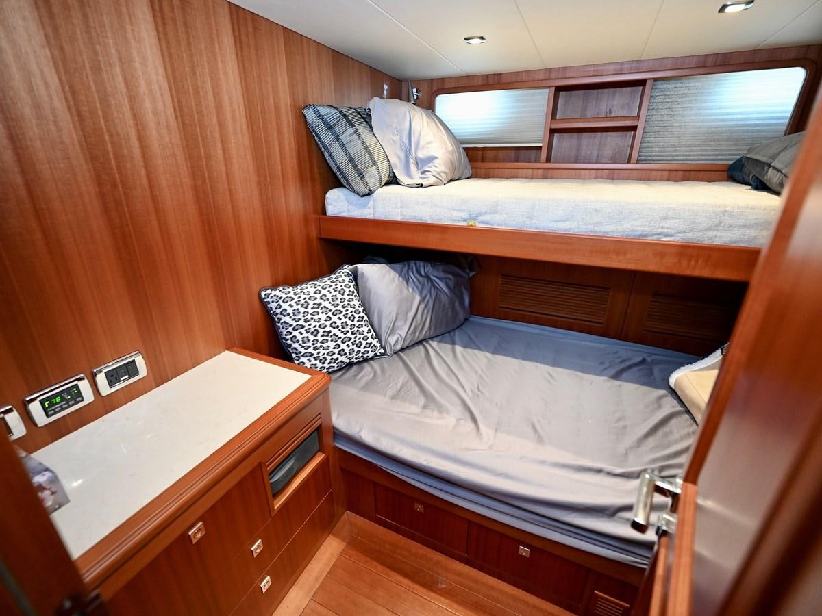 beds in a room aboard KNOT FLYING Yacht for Sale