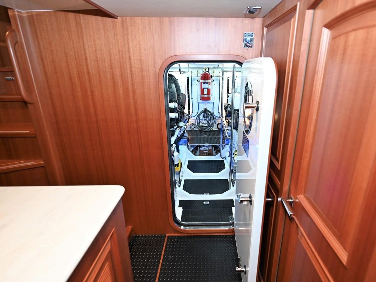 a car inside a garage aboard KNOT FLYING Yacht for Sale