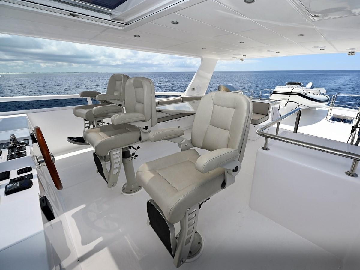 a group of chairs on a boat aboard KNOT FLYING Yacht for Sale