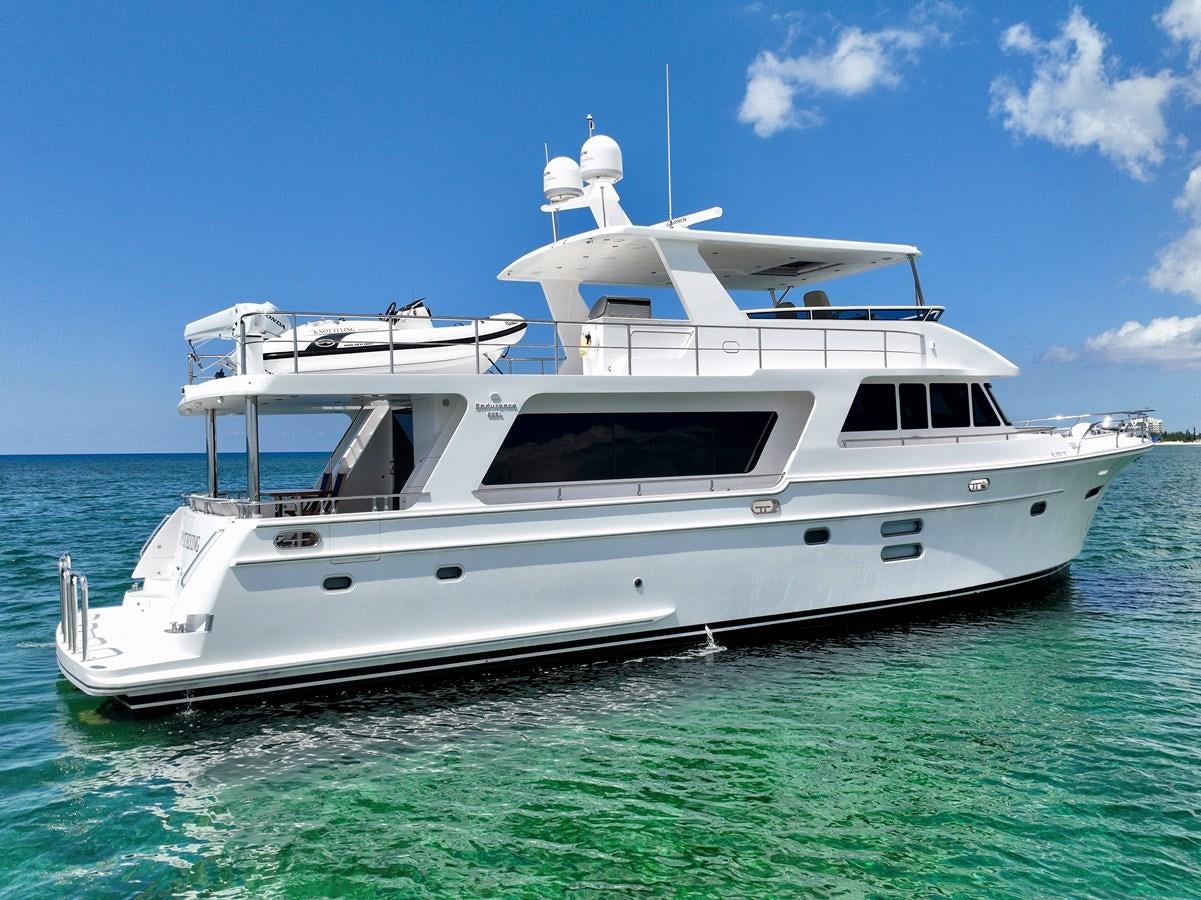 a white yacht in the water aboard KNOT FLYING Yacht for Sale