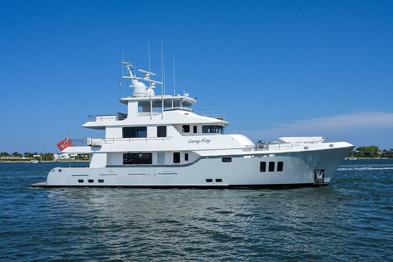 a white boat on the water aboard LACEY KAY Yacht for Sale