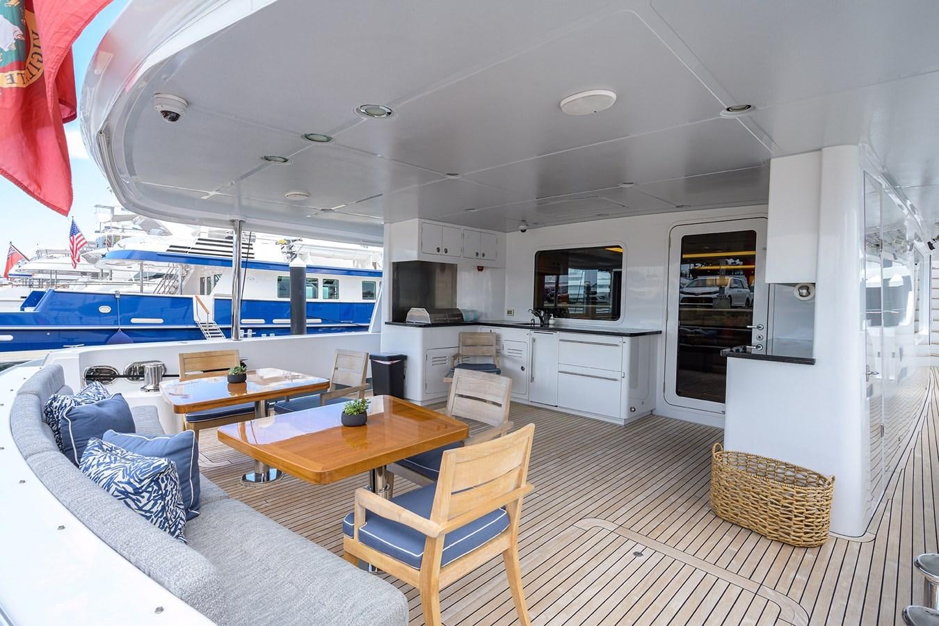 a living room with a large swimming pool aboard LACEY KAY Yacht for Sale